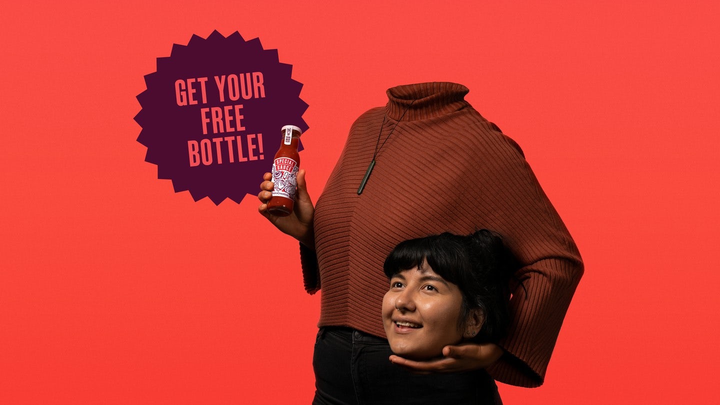Visual of person holding their head and bottle on Plato's Special Sauce campaign