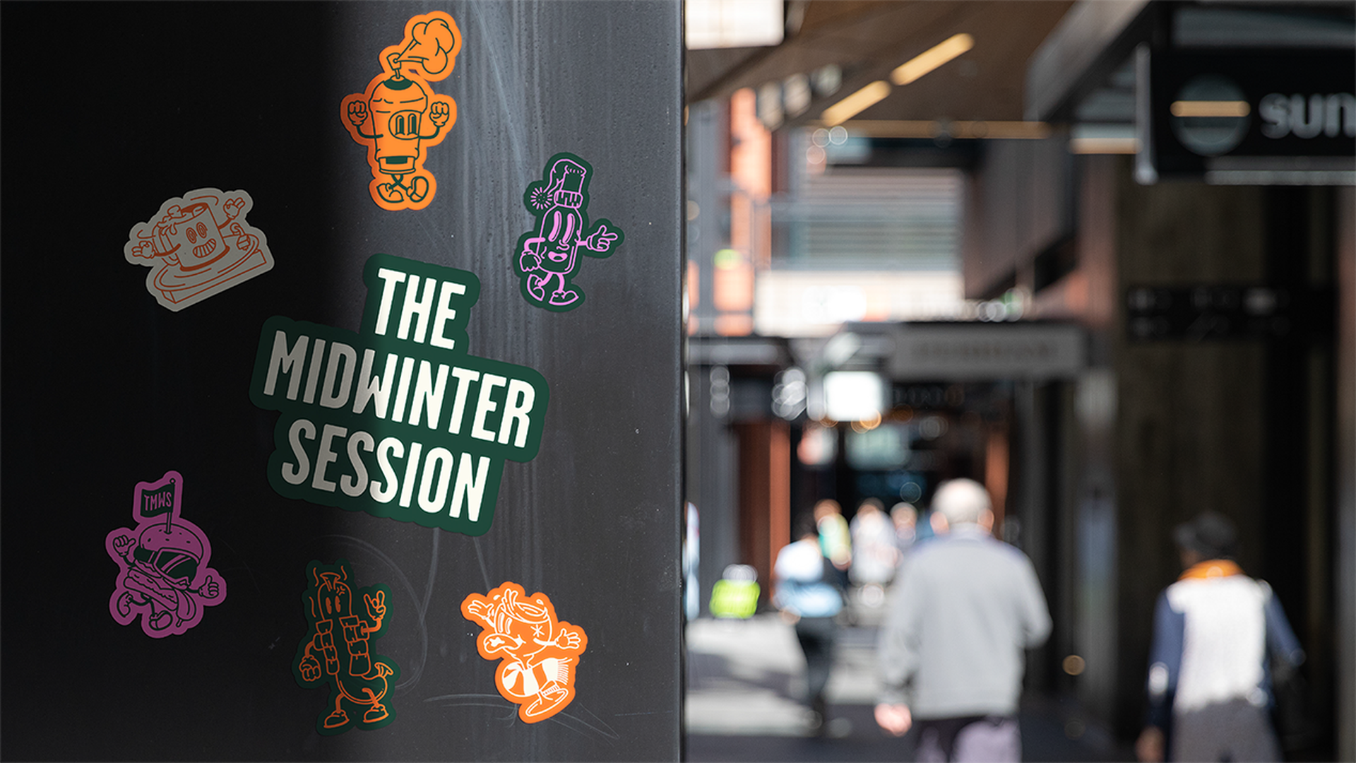 The Midwinter Session branded stickers on the streets of Christchurch