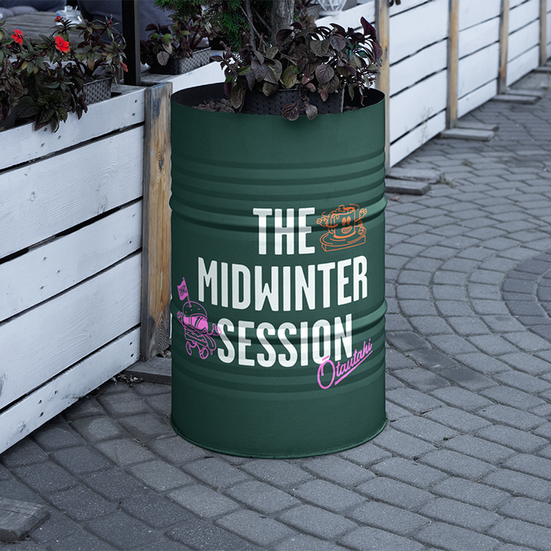 Barrel on street with The Midwinter Session branding